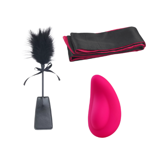 Amoura Couples Box Month 4 – The Silk Seduction featuring wearable clitoral vibrator, double-ended paddle tickler, and silk multiuse ribbon, elegantly arranged as a luxury intimacy subscription set.