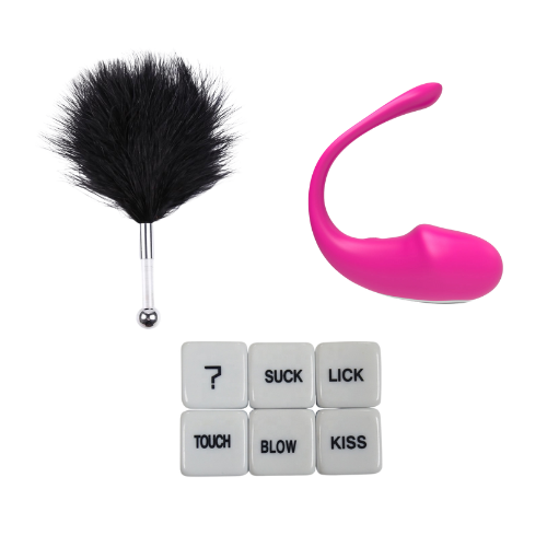 Amoura Couples Box Month 9 – The Tease Game featuring black feather tickler, role-play dice, and remote-controlled love egg, styled as a luxury couples subscription set.